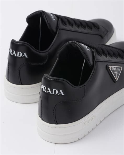 prada grey white leather sneakers|all black prada sneakers.